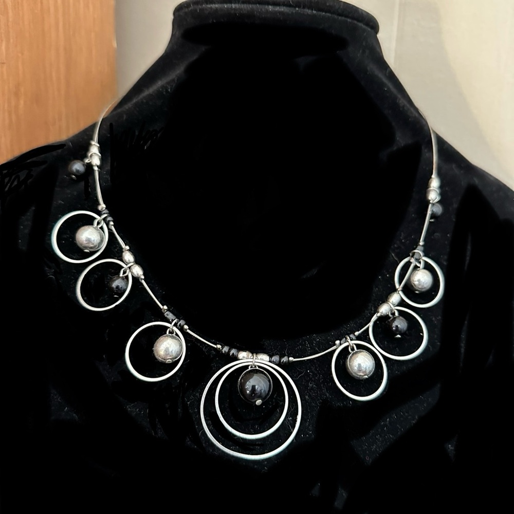 Elegant Silver Necklace with Circular Accents